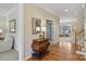 Hallway with hardwood floors and elegant decor at 10121 Edgecliff Rd, Huntersville, NC 28078