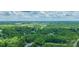 Aerial view of a city skyline surrounded by lush greenery, highlighting the urban landscape and natural beauty at 1069 Westlake Dr, Kannapolis, NC 28081