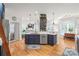 Open kitchen with stainless steel appliances, kitchen island, and ample counter space at 1069 Westlake Dr, Kannapolis, NC 28081