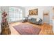 Bright living room with natural light from large windows, stylish seating, and hardwood floors at 1069 Westlake Dr, Kannapolis, NC 28081