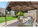 Backyard with a gazebo featuring outdoor furniture, a play set, and lush green grass at 11806 Stirling Field Dr, Pineville, NC 28134