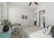 Bright bedroom with natural light, a ceiling fan, and desk area at 11806 Stirling Field Dr, Pineville, NC 28134