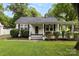 Charming single-Gathering home featuring a quaint front porch, well-maintained landscaping, and inviting curb appeal at 1210 Jackson Rd, Gastonia, NC 28052