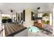 Relaxing covered front porch with seating and ample space for outdoor enjoyment, enhancing the home's appeal at 1210 Jackson Rd, Gastonia, NC 28052