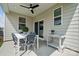 Covered patio with dining table, chairs, ceiling fan, and outdoor serving bar at 1225 Margo Mannor Dr, Fort Mill, SC 29708