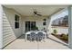 Covered patio with dining table, chairs, ceiling fan, and an outdoor serving bar at 1225 Margo Mannor Dr, Fort Mill, SC 29708