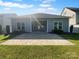 A well maintained backyard with a stone patio and grassy area at 13419 Morgan Lee Ave, Charlotte, NC 28213