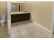 Bathroom featuring double sink vanity, granite countertops, and ample storage at 13419 Morgan Lee Ave, Charlotte, NC 28213