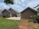 Back of house showing patio and exterior siding at 156 Tarrington Dr, Statesville, NC 28625