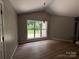 Bright dining room with large windows offering a pleasant view at 156 Tarrington Dr, Statesville, NC 28625