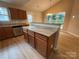 Kitchen with granite island, stainless steel dishwasher, and an open layout at 156 Tarrington Dr, Statesville, NC 28625