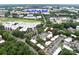 Aerial view highlighting the community's location near SouthPark Mall and surrounding greenery at 1708 Roxborough Rd # C, Charlotte, NC 28211
