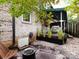 Charming backyard featuring patio, firepit, and stone landscaping at 1708 Roxborough Rd # C, Charlotte, NC 28211
