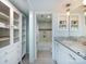 Bathroom featuring granite countertop, storage cabinet, and doorway to bathtub at 1708 Roxborough Rd # C, Charlotte, NC 28211