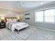 Spacious main bedroom with plush carpet and a bench at the foot of the bed at 1708 Roxborough Rd # C, Charlotte, NC 28211