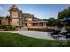 Enjoy an outdoor oasis featuring a pool, lounge chairs, covered patio, and manicured lawn at 175 Rehoboth Ln, Mooresville, NC 28117