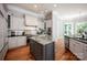 Bright kitchen features a center island, stainless steel appliances, and modern design at 175 Rehoboth Ln, Mooresville, NC 28117