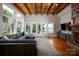 Living room with hardwood floors, large windows, and a view of the lake at 175 Rehoboth Ln, Mooresville, NC 28117