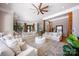 Spacious living room with multiple seating areas, natural wood accents, and views to other rooms at 175 Rehoboth Ln, Mooresville, NC 28117