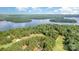 Aerial view of golf course with lake views at 177 Yadkin Falls Rd, New London, NC 28127