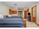 Comfortable bedroom with twin beds, built-in shelving, and a window view at 177 Yadkin Falls Rd, New London, NC 28127