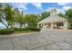 Inviting lakeside clubhouse with spacious porch and rocking chairs for relaxing at 177 Yadkin Falls Rd, New London, NC 28127