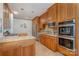 Classic kitchen with stainless steel appliances, wood cabinets and marble countertops at 177 Yadkin Falls Rd, New London, NC 28127