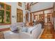 The living room has vaulted ceilings, exposed beams, and an open floor plan at 177 Yadkin Falls Rd, New London, NC 28127
