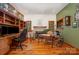Office space with lots of windows and a wood burning fireplace at 177 Yadkin Falls Rd, New London, NC 28127