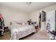 Bedroom featuring neutral walls, carpeted floors, and a doorway to another room at 201 Oakland Dr, Lowell, NC 28098