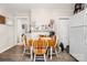 Kitchen area featuring an expandable table with seating for four and a refrigerator at 201 Oakland Dr, Lowell, NC 28098