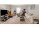 Comfortable living room featuring neutral carpeting and plenty of natural light at 201 Oakland Dr, Lowell, NC 28098