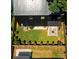 Aerial view of modern home with backyard patio and lush landscaping at 2107 W Trade St, Charlotte, NC 28216