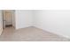 Bright, neutral bedroom with carpet and natural light at 2107 W Trade St, Charlotte, NC 28216