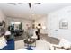 Open-concept living space with kitchen island, dining area, and comfortable seating at 2107 W Trade St, Charlotte, NC 28216