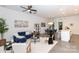Open-concept living and dining area with modern furnishings, decor, and plenty of light at 2107 W Trade St, Charlotte, NC 28216