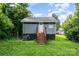 Rear view of a house with stairs leading up to the back door at 2312 Tate St, Charlotte, NC 28216