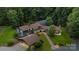 Aerial view of the home with manicured lawn, carport and in-ground pool at 307 E Allenton St, Mount Gilead, NC 27306