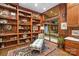 Comfortable living room featuring wooden bookshelf and decor, plus outdoor view at 307 E Allenton St, Mount Gilead, NC 27306