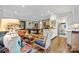 Bright living room featuring billiard table, fireplace, and bar area at 307 E Allenton St, Mount Gilead, NC 27306