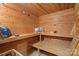 Wood-paneled sauna with built-in benches, offering a relaxing and luxurious spa-like experience at 307 E Allenton St, Mount Gilead, NC 27306