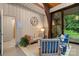 Inviting sunroom with comfortable seating and serene outdoor view, perfect for relaxation and entertaining at 307 E Allenton St, Mount Gilead, NC 27306