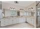 Bathroom featuring dual sinks, granite countertops, and a large mirror at 3996 Channel Point Ln, Denver, NC 28037