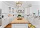 Bright kitchen with a large central island, modern appliances, and ample counter space at 3996 Channel Point Ln, Denver, NC 28037