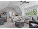 Spacious room with sectional sofa, round table, and natural light streaming in from a window at 3996 Channel Point Ln, Denver, NC 28037