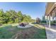 Backyard with a fire pit and playground, perfect for entertaining and enjoying the outdoors at 4113 Bent Green Ln, Monroe, NC 28112