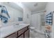 Neat bathroom featuring a modern sink, toilet, and polka-dotted shower curtain at 4113 Bent Green Ln, Monroe, NC 28112