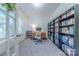Dedicated home office space with built-in bookshelves, a comfortable desk, and ample natural light at 4113 Bent Green Ln, Monroe, NC 28112