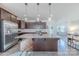 Beautiful kitchen with a large island, stainless steel appliances, and ample cabinet space at 4113 Bent Green Ln, Monroe, NC 28112