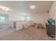 Upper-level playroom featuring neutral carpet, reading space, and easy access to other rooms at 4113 Bent Green Ln, Monroe, NC 28112